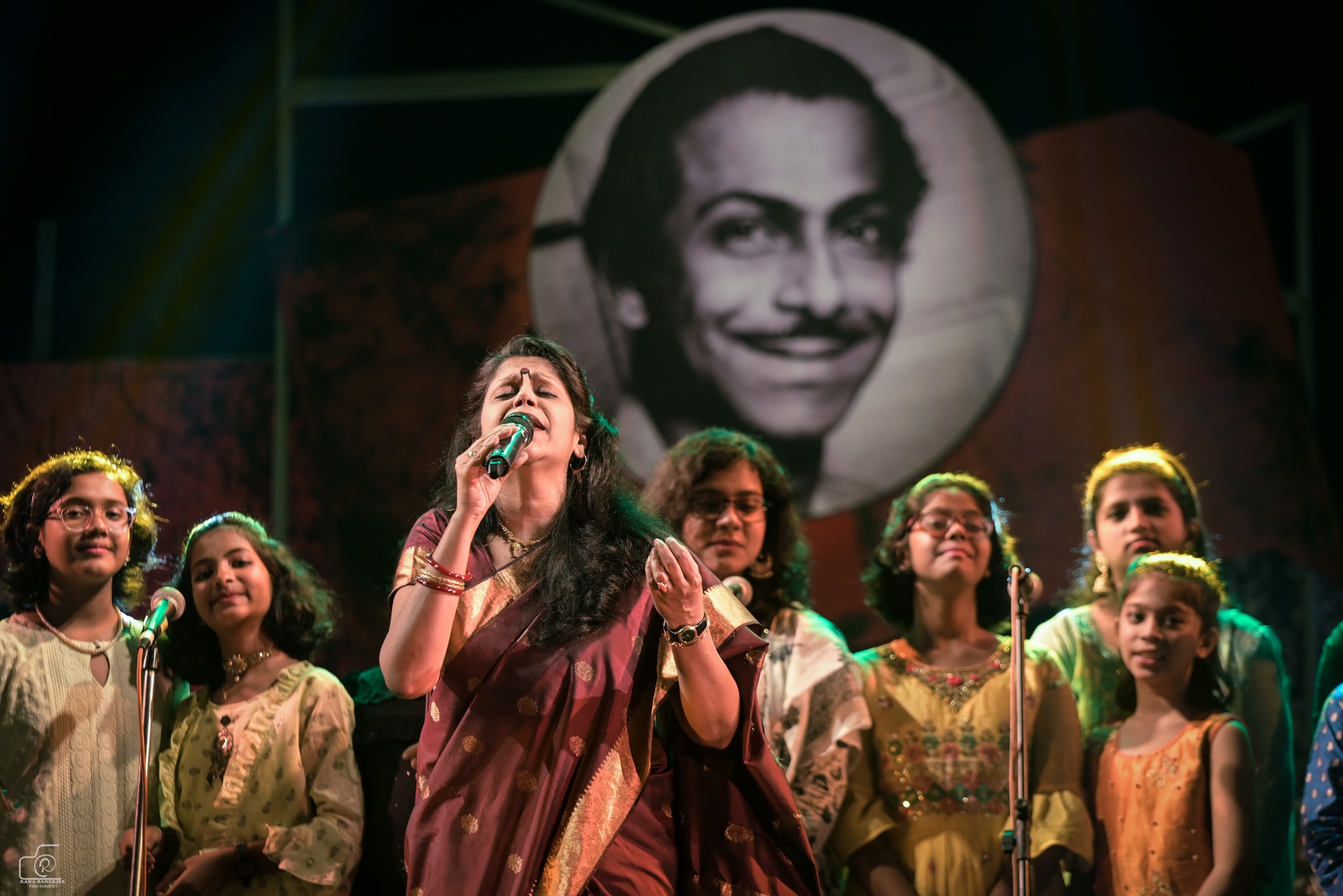 Antara Chowdhury performing 'O Mago Ma' with the children of Surodhwoni.